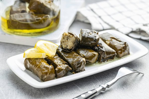 What's the Technique for Perfect Greek Dolmades with Lemon Egg Sauce?